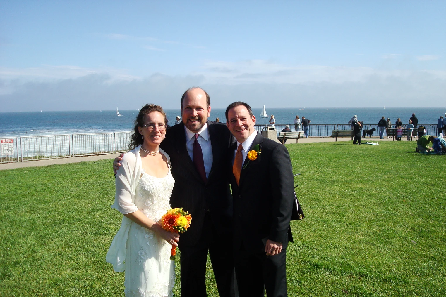 Howard with Bride and Groom after beach ceremony