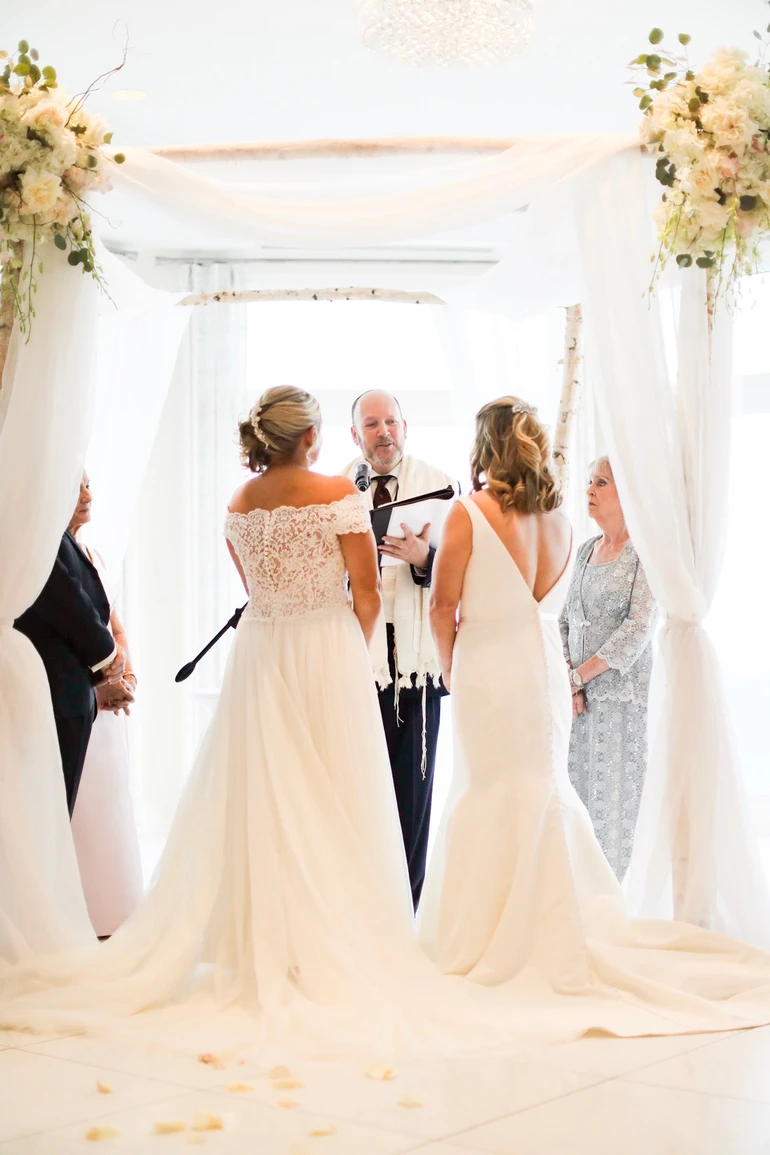 Howard with two Brides at the altar